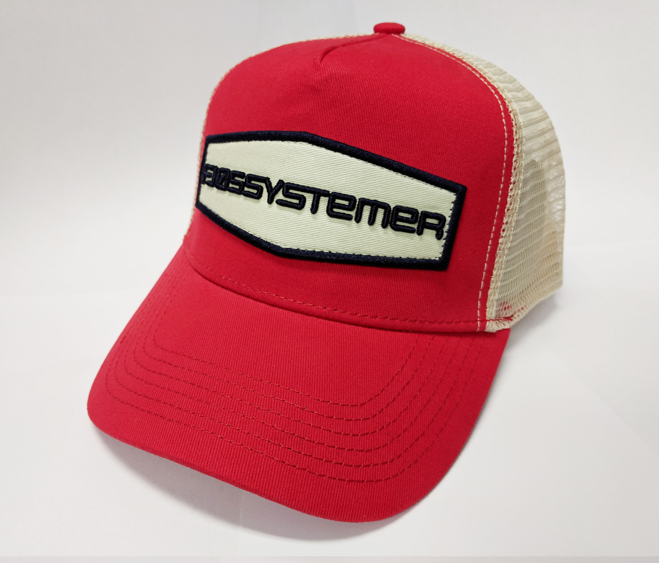 Fjøssystemer caps